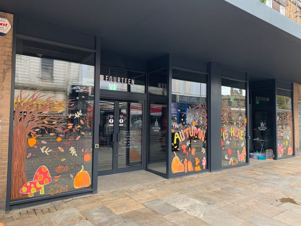 Pupils pitch in with ‘awesomely autumn’ window display in Darwen