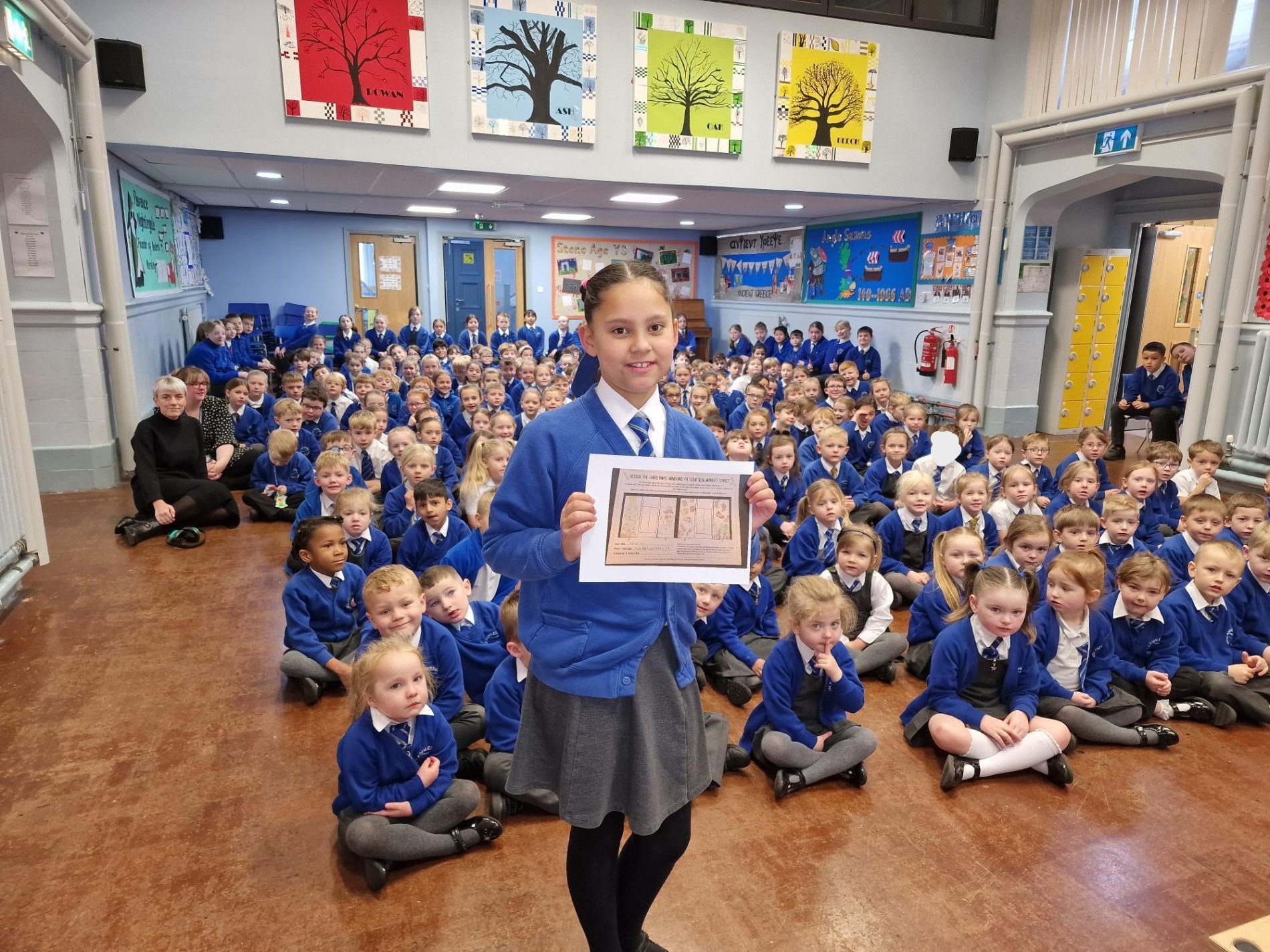 Darwen pupil designs Christmas window art in Darwen Town Centre